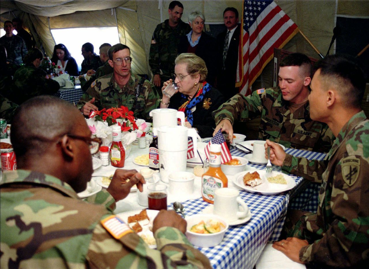 Albright has lunch with US troops serving in Bosnia in 1997.