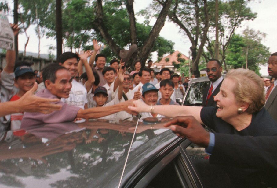 Albright greets well-wishers in Ho Chi Minh City, Vietnam, in 1997. She was the first US secretary of state to visit the city since the Vietnam War.