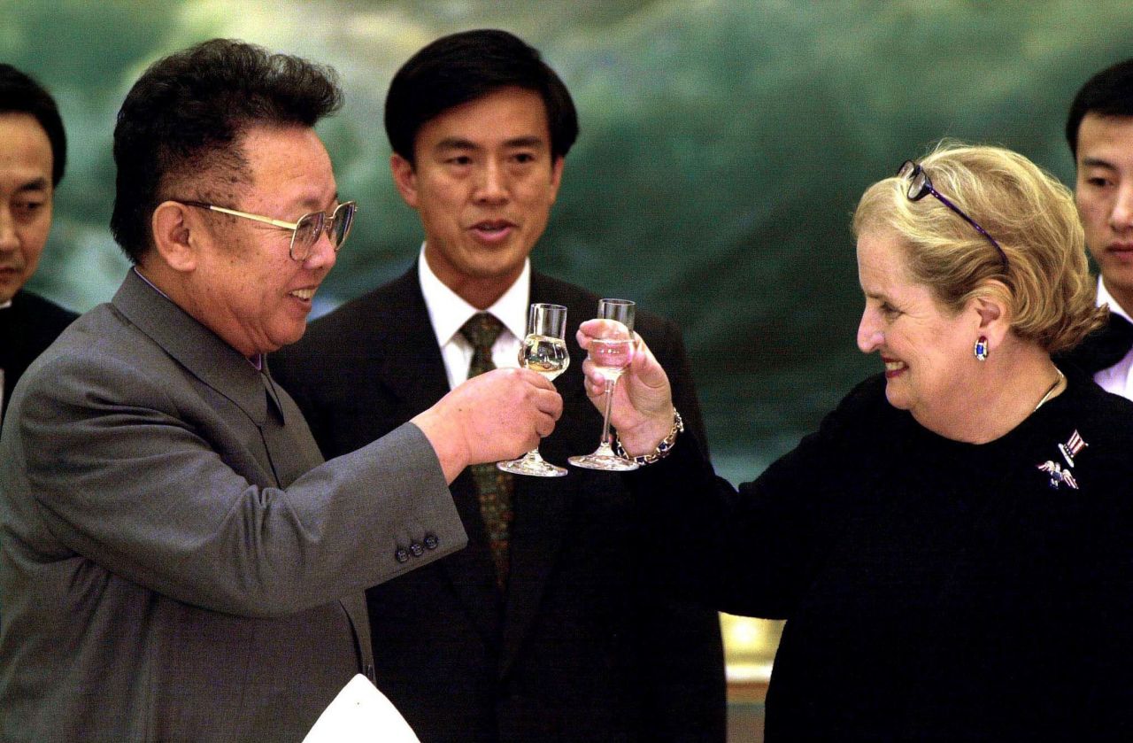 Albright shares a toast with North Korean leader Kim Jong Il at a dinner in Pyongyang, North Korea, in 2000. Albright left office in 2001 after President Clinton's second term ended.