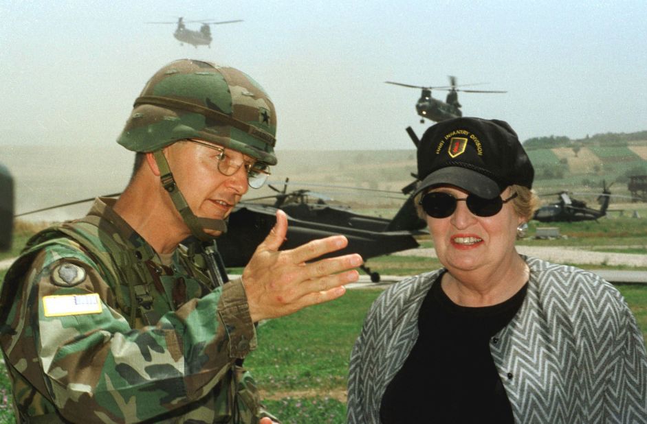 Albright talks to US Brig. Gen. John Craddock, commander of the US troops that would be taking part in the Kosovo implementation force in 1999. Albright was crucial in pushing President Clinton to intervene in Kosovo to prevent a genocide against ethnic Muslims by former Serbian leader Slobodan Milosevic.