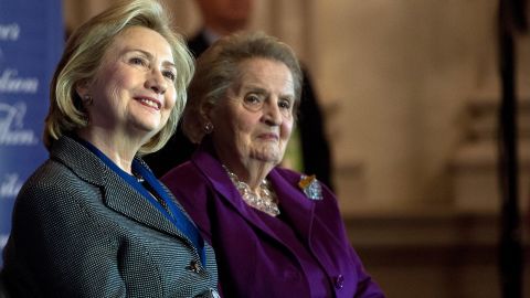 Former US Secretaries of State Hillary Clinton (L) and Madeleine Albright listen to a speaker after Clinton received the 2013 Lantos Human Rights Prize during a ceremony on Capitol Hill in Washington on December 6, 2013.  