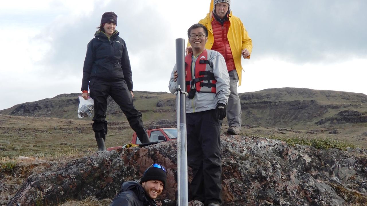 The research team, including (counterclockwise from left) Isla Castañeda, Tobias Schneider, Boyang Zhao and Raymond Bradley, are seen collecting lake sediment cores in southern Greenland.