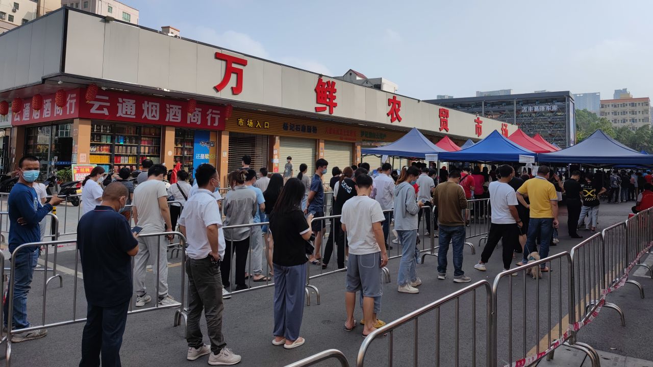  People line up for nucleic acid testing at a temporary Covid-19 testing site on March 22, 2022 in Shenzhen.