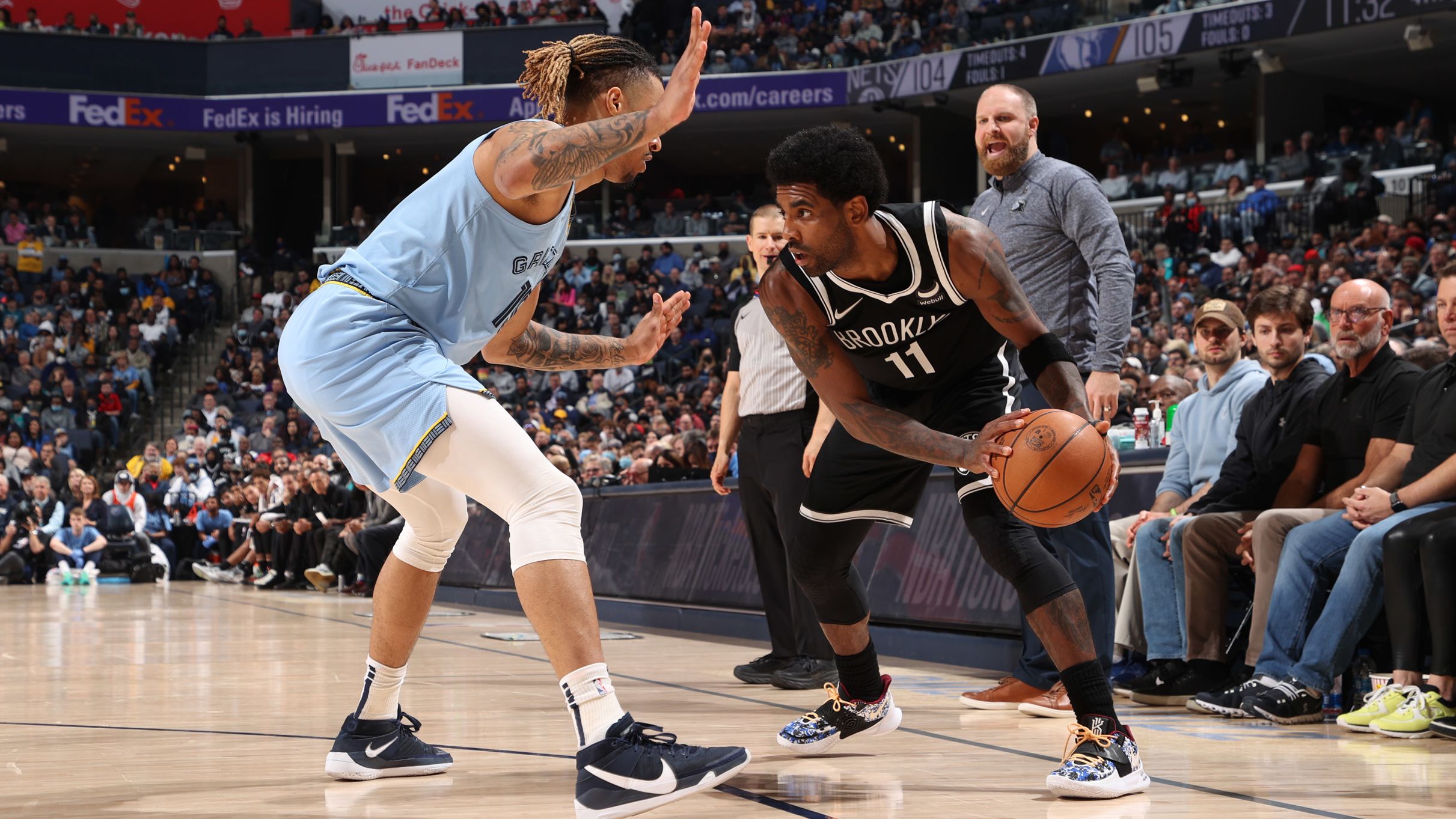 Brooklyn Nets guard Kyrie Irving, right, scored 43 points in Wednesday's game against the Memphis Grizzlies in Memphis.