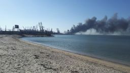 Smoke rises after shelling near a seaport in Berdyansk, Ukraine, Thursday, March 24, 2022. Ukraine's navy reported Thursday that it had sunk the Russian ship Orsk in the Sea of Asov near the port city of Berdyansk. It released photos and video of fire and thick smoke coming from the port area. Russia did not immediately comment on the claim. (AP Photo)