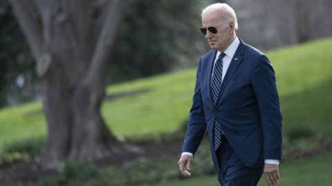 President Joe Biden walks on the South Lawn of the White House before boarding Marine One in Washington, DC, on March 18, 2022. 
