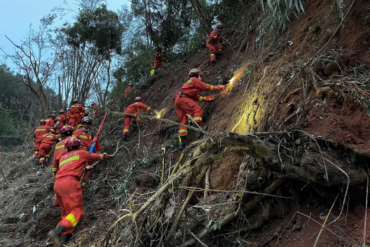 Rescuers conduct search operations at the site of a plane crash in southern China's Guangxi region on Tuesday, March 22. <a href="https://www.cnn.com/2022/03/22/china/china-eastern-airlines-plane-crash-tuesday-intl-hnk/index.html" target="_blank">No survivors were found</a> after a China Eastern Airlines plane crashed with 132 people aboard.