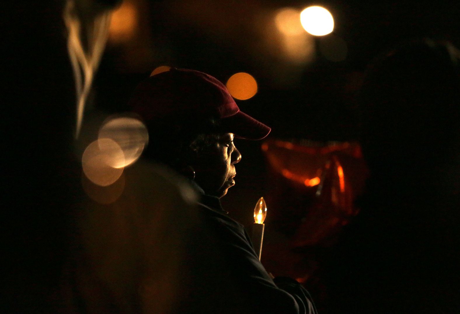 Friends and family of Sierra Jenkins attend a vigil in her memory Sunday, March 20, in Norfolk, Virginia. Jenkins, a Virginian-Pilot newspaper reporter and a former CNN news assistant, <a href="index.php?page=&url=https%3A%2F%2Fwww.cnn.com%2F2022%2F03%2F19%2Fus%2Fsierra-jenkins-virginian-pilot-reporter-killed-shooting%2Findex.html" target="_blank">was fatally shot in an early morning shooting</a> on Saturday. She was 25.