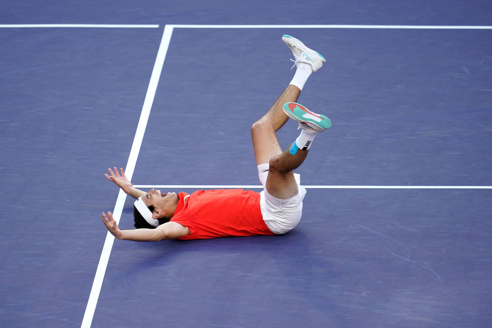 Taylor Fritz reacts after defeating Rafael Nadal <a href="index.php?page=&url=https%3A%2F%2Fwww.cnn.com%2F2022%2F03%2F21%2Ftennis%2Ftaylor-fritz-rafael-nadal-indian-wells-spt-intl%2Findex.html" target="_blank">to win the BNP Paribas Open tennis tournament</a> on Sunday, March 20. Fritz won the match 6-3, 7-6. It was Nadal's first loss of 2022, and it was Fritz's first Masters 1000 title.