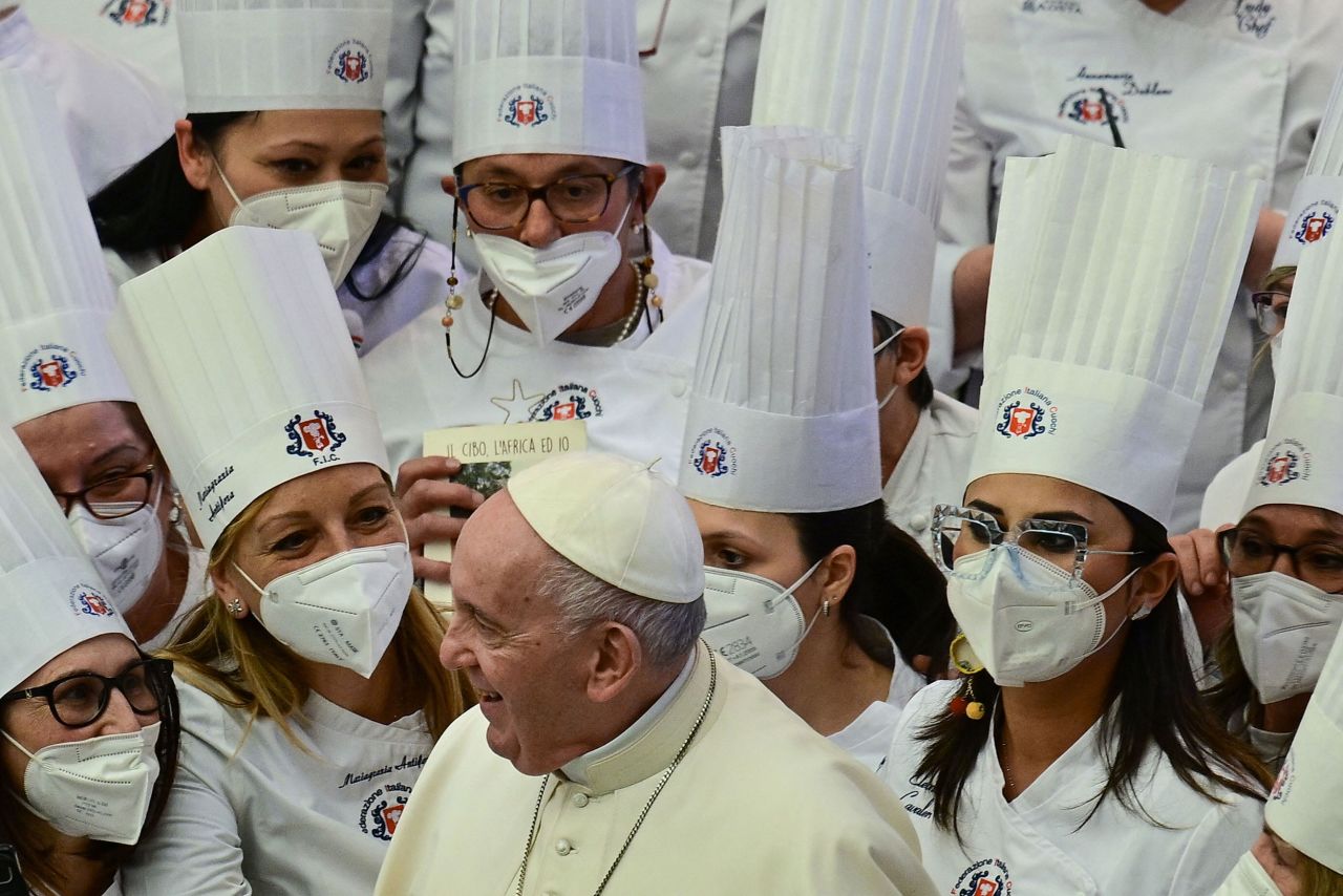 Pope Francis meets with members of the Italian Federation of Chefs as he holds his weekly general audience at the Vatican on Wednesday, March 23.