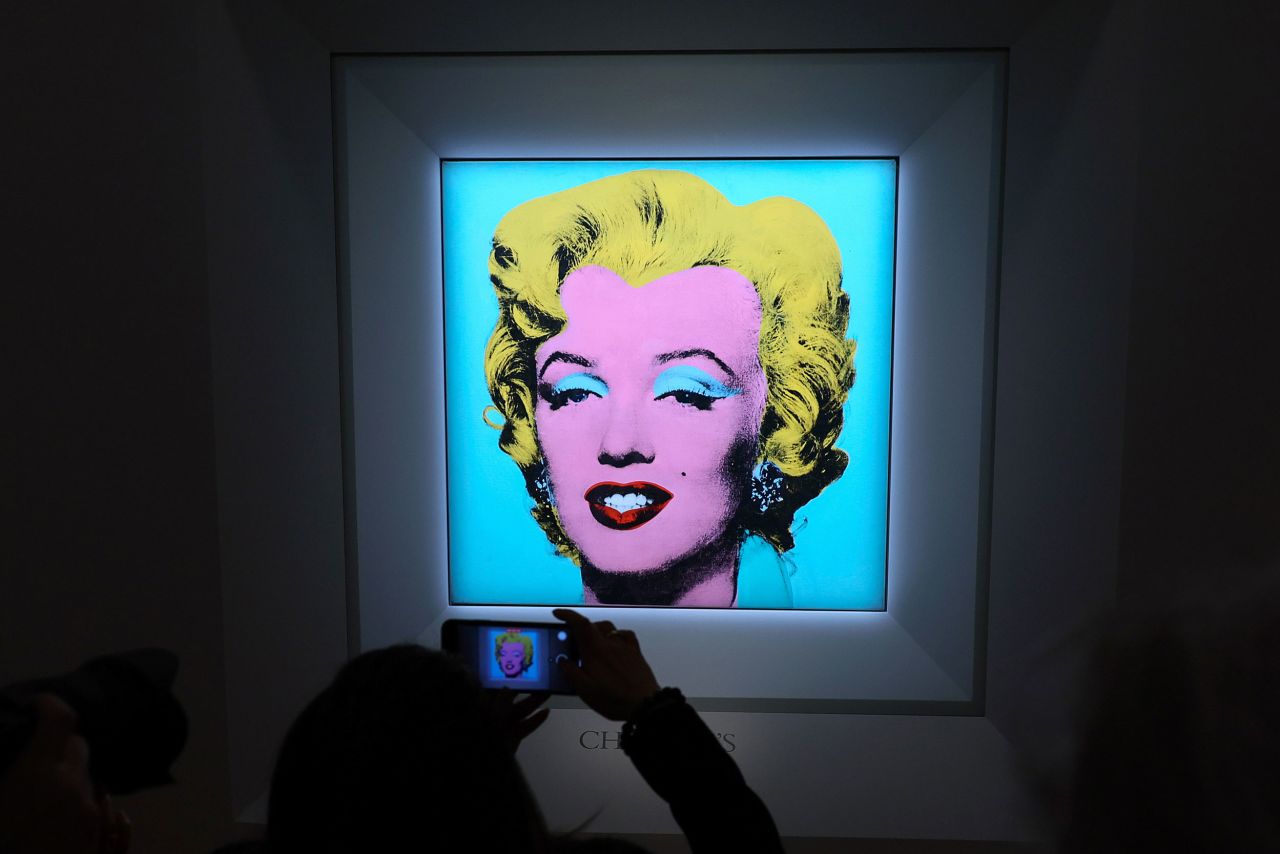 "Shot Sage Blue Marilyn," one of Andy Warhol's iconic Marilyn Monroe portraits, is photographed at the Christie's auction house in New York on Monday, March 21. It will go on sale in May, and <a href="https://www.cnn.com/style/article/andy-warhol-shot-sage-blue-marilyn-auction-record/index.html" target="_blank">Christie's is expecting bids "in the region of" $200 million.</a> 