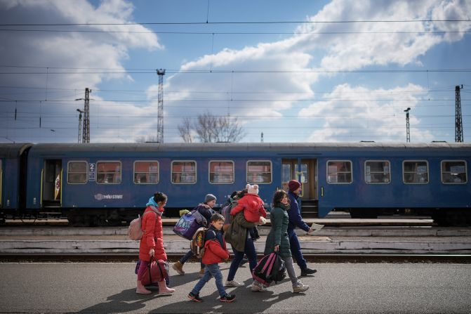<strong>Hungary:</strong> Ukraine's neighbor is also seeing many refugees arrive, such as at the border train station of Zahony.