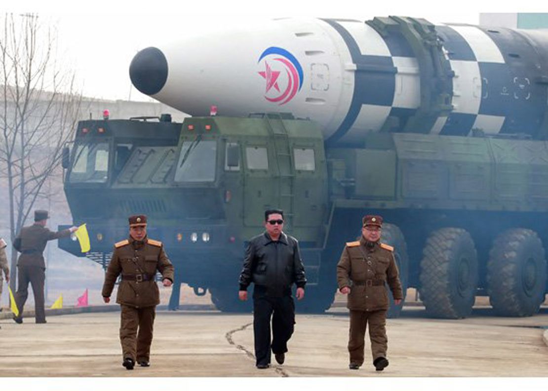 North Korean leader Kim Jong Un walks in front of a missile, in a photo released Friday by state media.