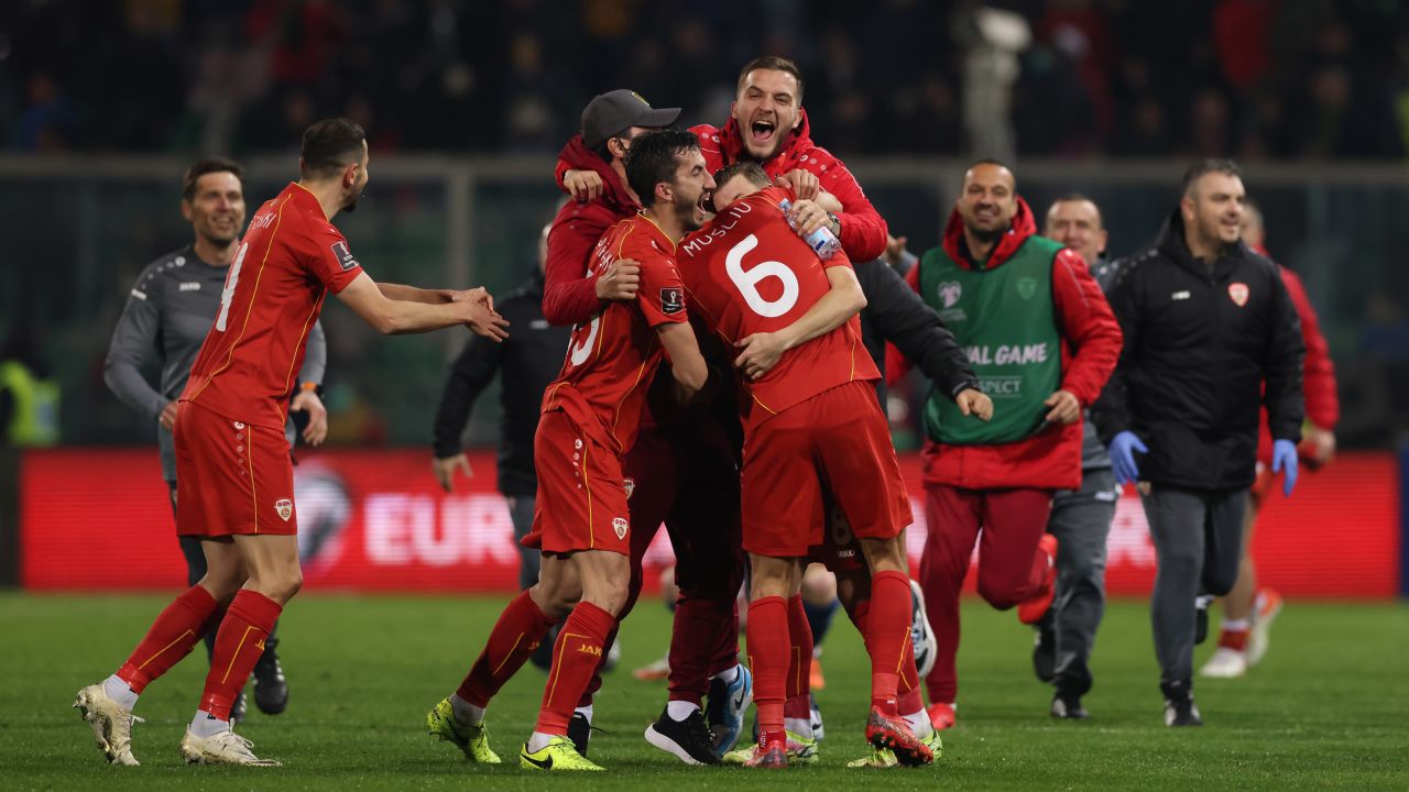 North Macedonia players celebrate beating Italy.