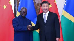 Chinese President Xi Jinping meets with Solomon Islands' Prime Minister Manasseh Sogavare in Beijing in 2019.