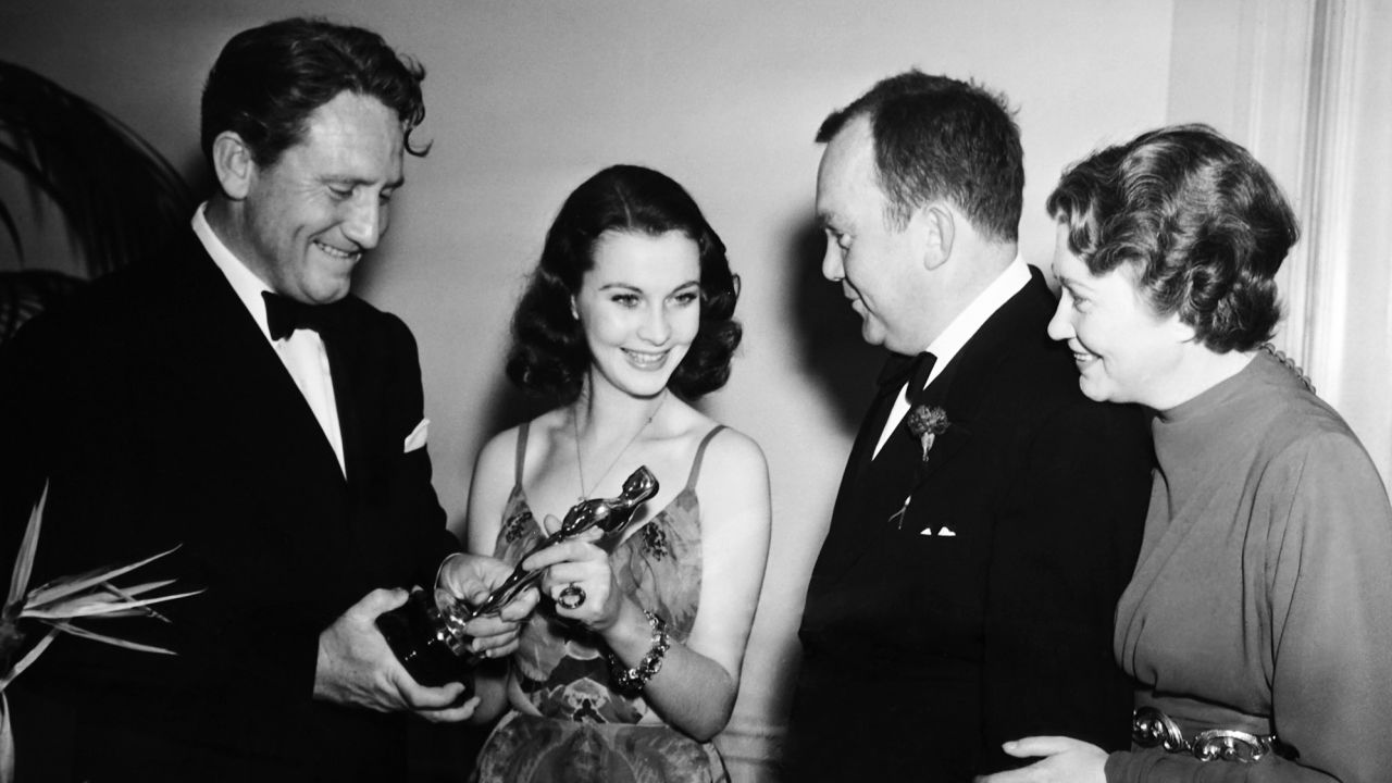 From left: Spencer Tracy and Vivien Leigh holding her Best Actress Academy Award for "Gone with the Wind," as Thomas Mitchell and Fay Bainter look on, following the awards ceremony in Los Angeles on February 29, 1940.