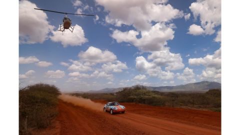 The route for the 2022 race covered thousands of kilometers over the course of nine days. Italian driver Federico Polese races in a Porsche 911 with a helicopter tracking the action.