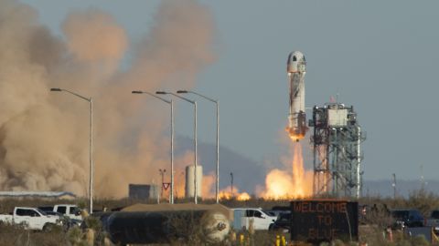 A Blue Origin New Shepard rocket launches on December 11, 2021, in West Texas near Van Horn.