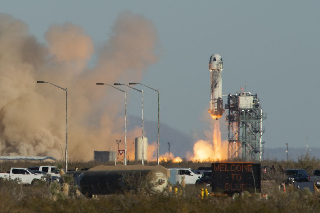 A Blue Origin New Shepard rocket launches on December 11, 2021, in West Texas near Van Horn. 