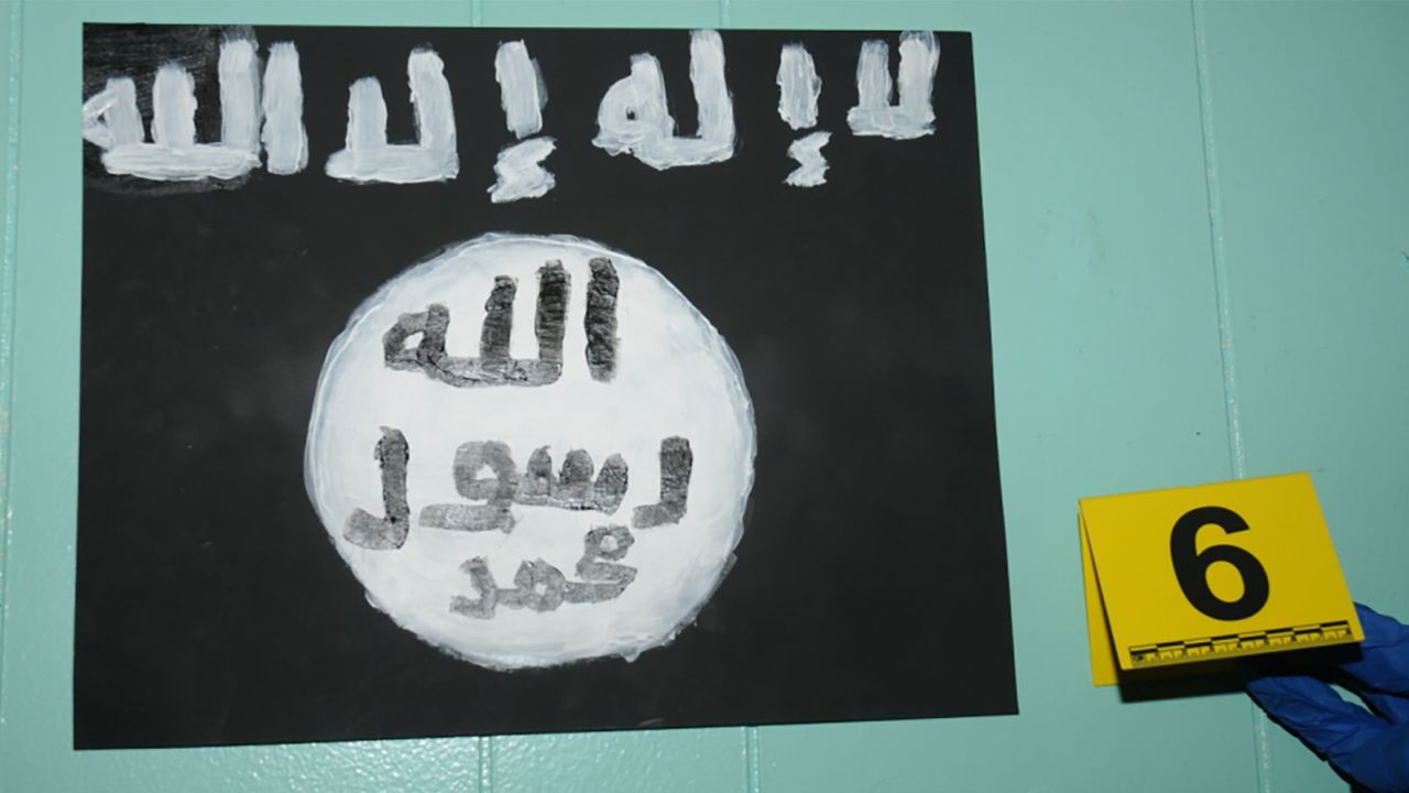 A hand-painted version "of the flag used by the foreign terrorist organization ISIS," according to court documents.