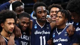 KC Ndefo #11 of the St. Peter's Peacocks celebrates with teammates after defeating the Murray State Racers 70-60 in the second round of the 2022 NCAA Men's Basketball Tournament at Gainbridge Fieldhouse on March 19, 2022 in Indianapolis, Indiana.