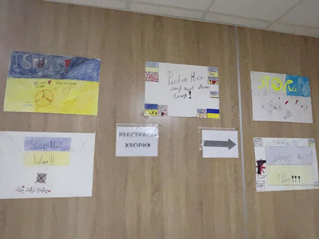 Children at the hospital create pictures about the war.