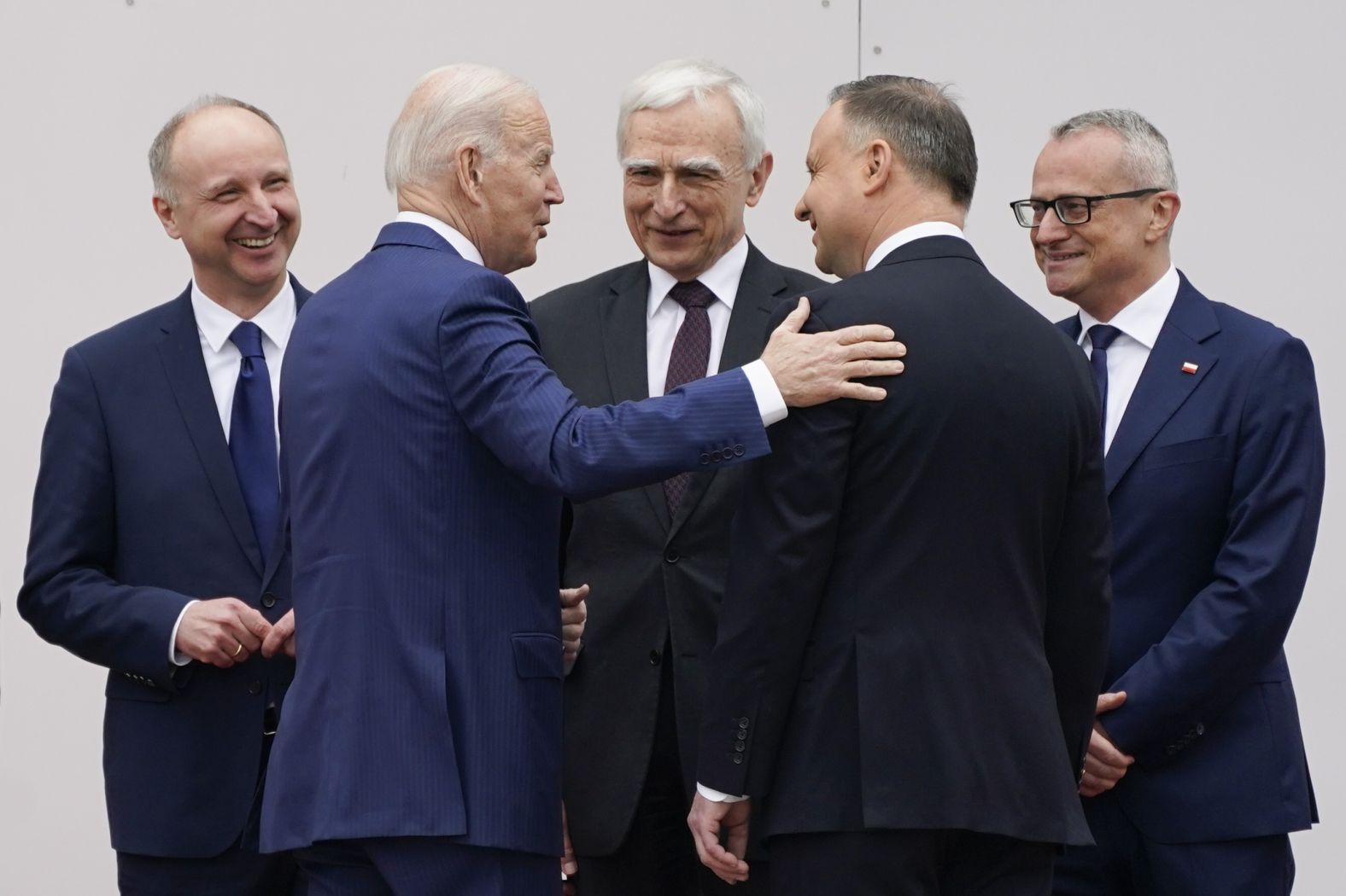 Biden speaks with Duda as he arrives at the Presidential Palace on Saturday.