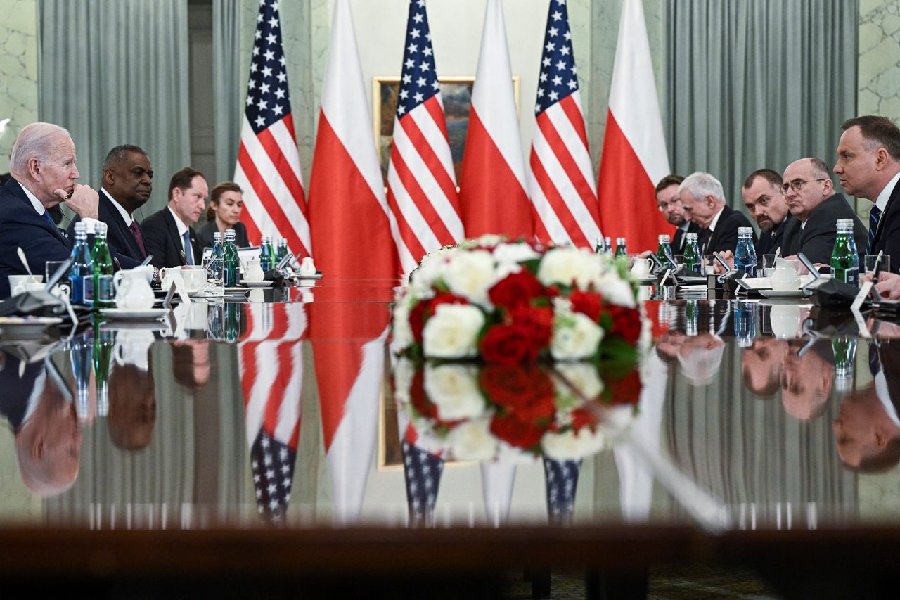 Biden meets with Polish President Andrzej Duda, far right, at the Presidential Palace in Warsaw on Saturday.
