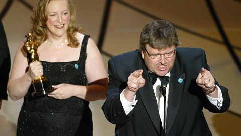 Michael Moore denounced the US invasion of Iraq while accepting the Oscar for best documentary at the 2003 Academy Awards.