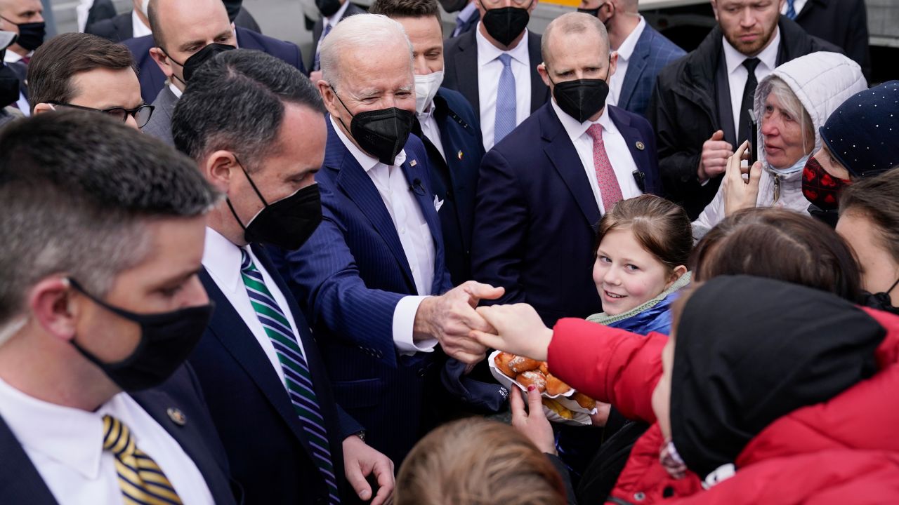 Biden meets with Ukrainian refugees and humanitarian aid workers in Warsaw on Saturday. 