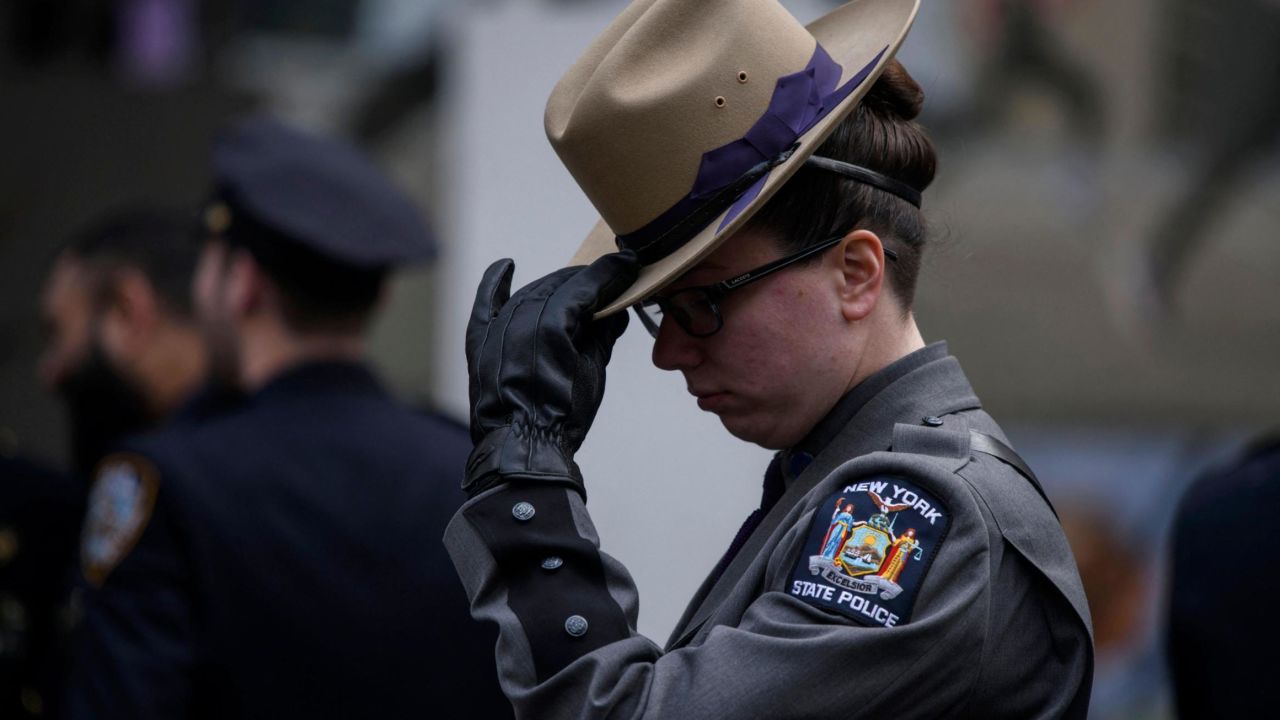 New York police officers gather for the funeral of NYPD officer Wilbert Mora on February 2, 2022 in New York.