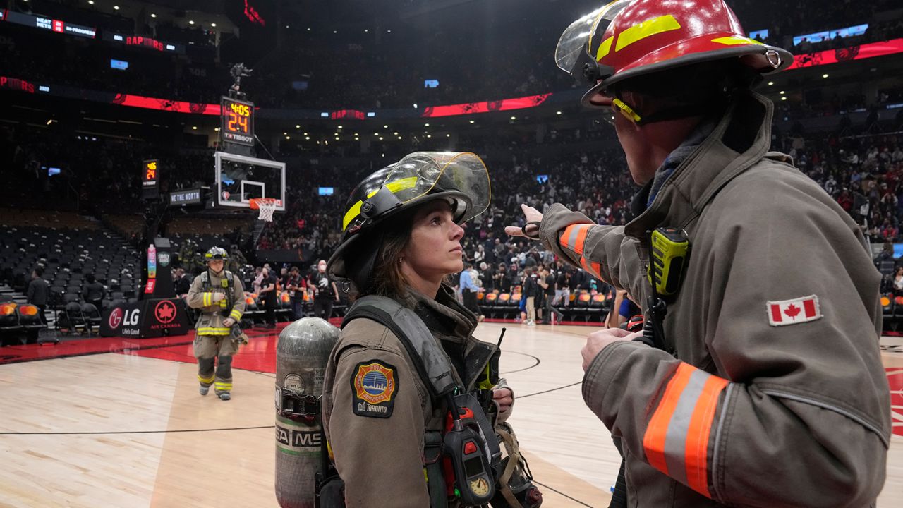 The NBA game between the Toronto Raptors and the Indiana Pacers was suspended as firefighters worked to evacuate the building.