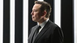 Tesla CEO Elon Musk is pictured as he attends the start of the production at Tesla's "Gigafactory" on March 22, 2022 in Gruenheide, southeast of Berlin. - US electric car pioneer Tesla received the go-ahead for its "gigafactory" in Germany on March 4, 2022, paving the way for production to begin shortly after an approval process dogged by delays and setbacks. 