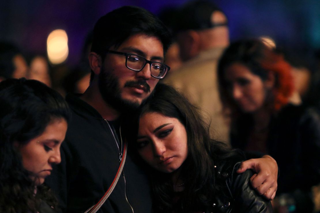 Fans react after learning of the death of Foo Fighters' drummer Taylor Hawkins, at the Festival Estéreo Picnic in Bogotá.
