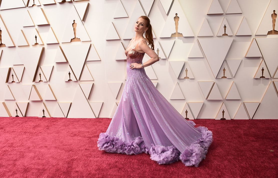 Jessica Chastain, best actress nominee for "The Eyes of Tammy Faye," dressed in Gucci for the ceremony, sporting a two-toned colored dress with a flowing train.