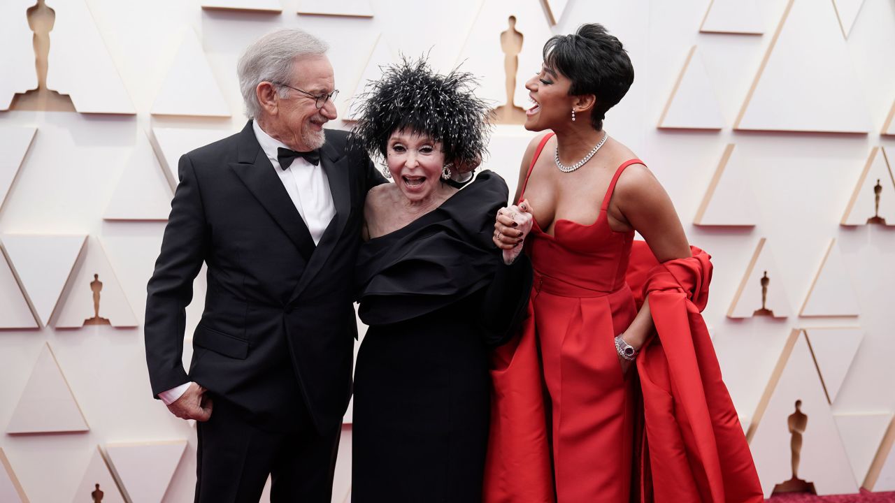 Steven Spielberg, from left, Rita Moreno and Ariana DeBose arrive at the Oscars on Sunday.