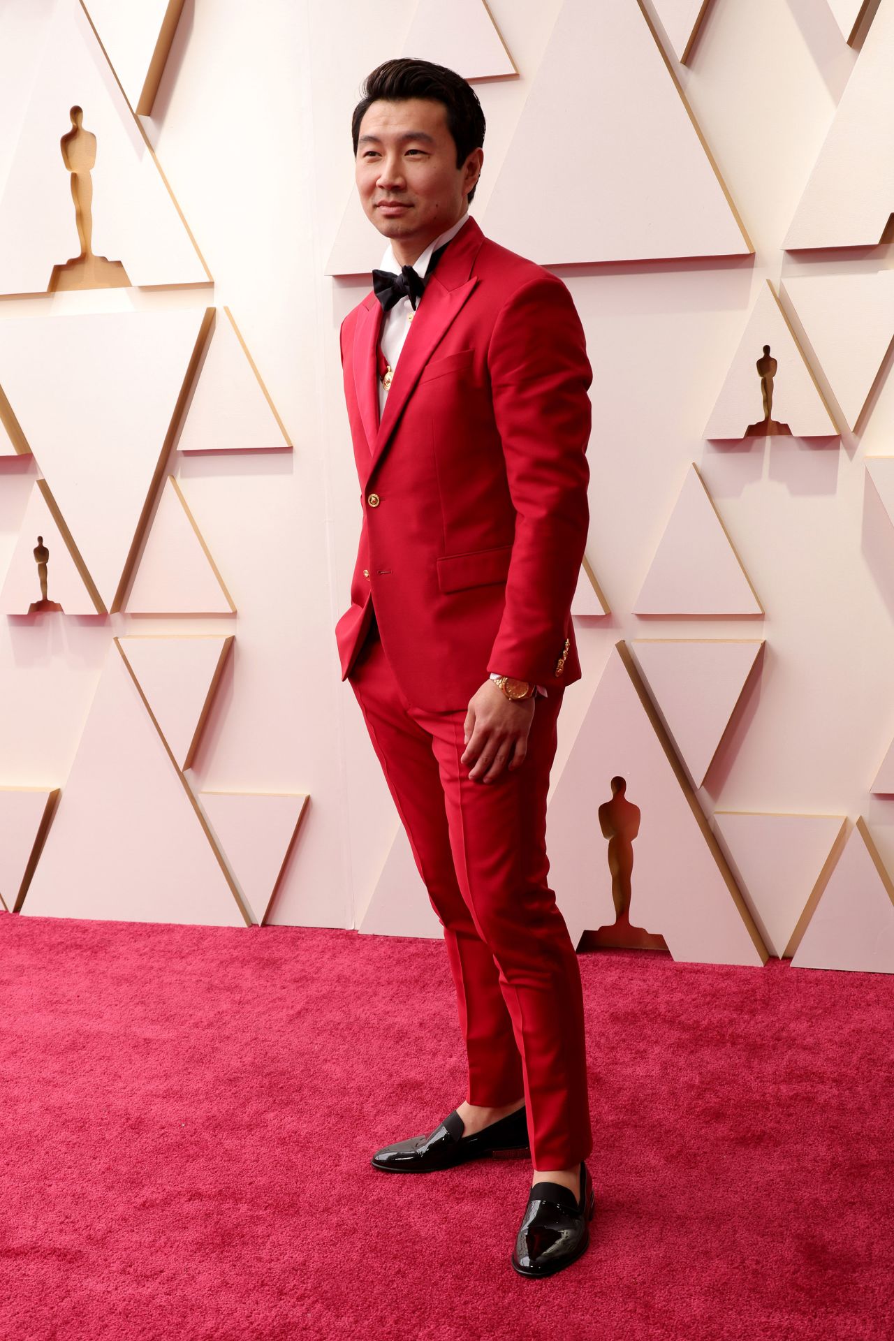 "Shang-Chi and the Legend of the Ten Rings" actor and Oscars presenter Simu Liu wore a red Versace suit with gold detailing.