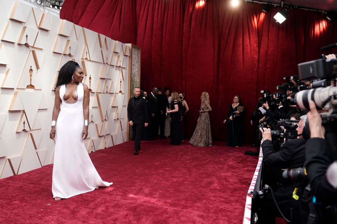 "King Richard" co-executive producer Venus Williams in a white Elie Saab gown with silver accents. 