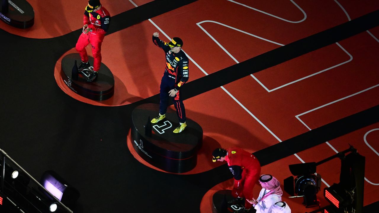 Verstappen celebrates on the podium after winning the Saudi GP.