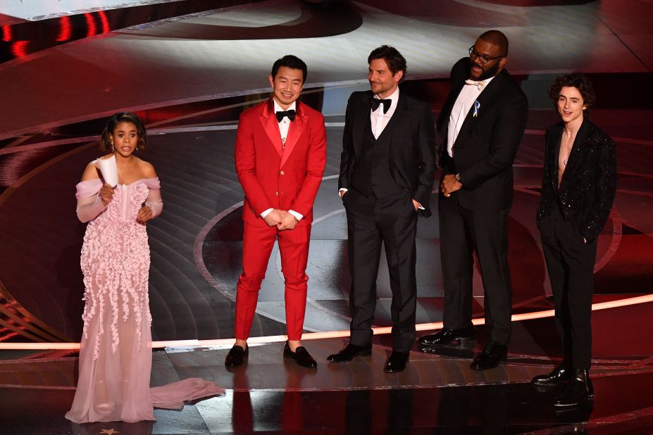 Hall flirts on stage with, from left, Simu Liu, Bradley Cooper, Tyler Perry and Timothée Chalamet. She had joked earlier in the show about how she was single.