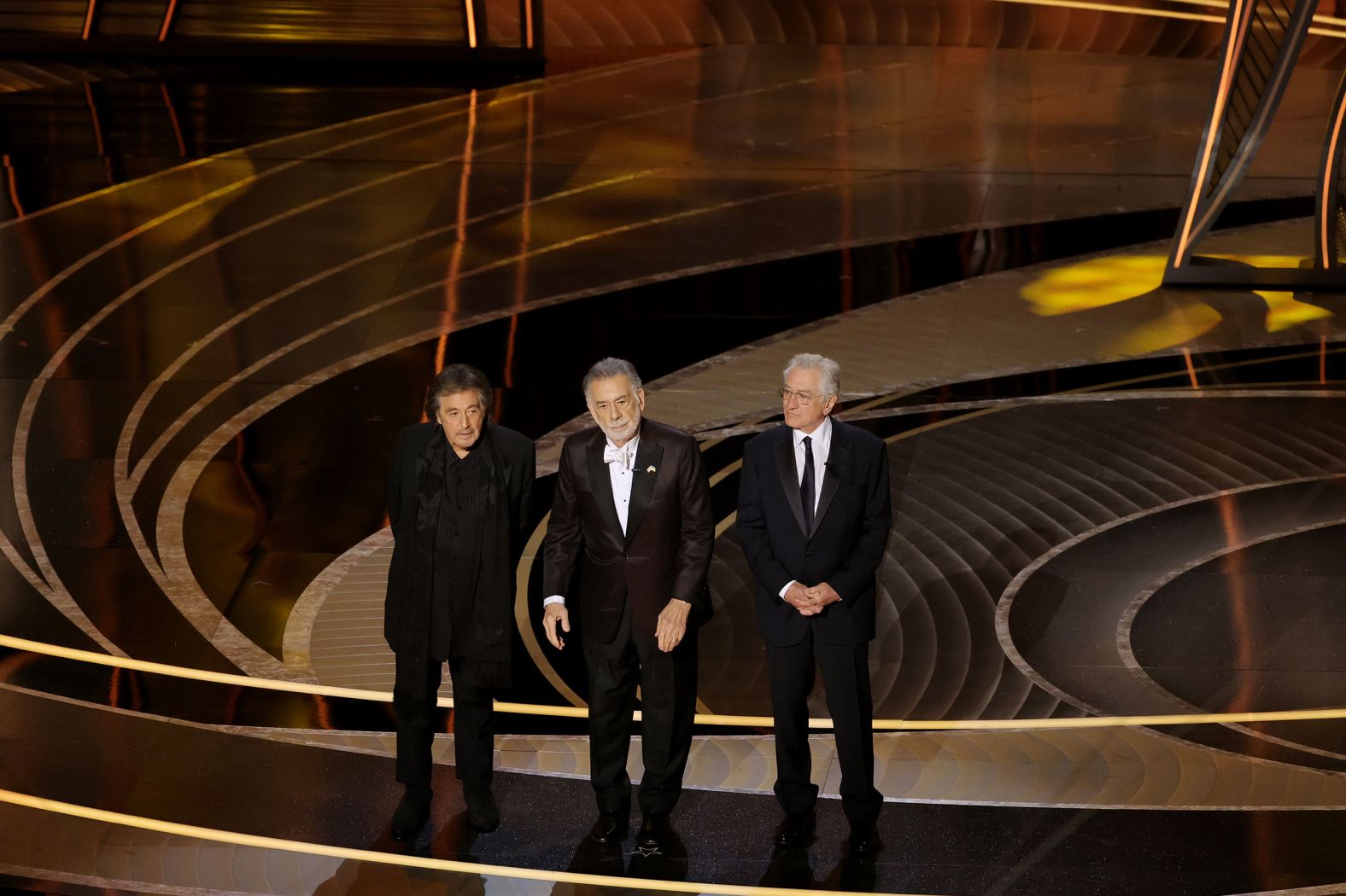 From left, Al Pacino, Francis Ford Coppola and Robert De Niro appear on stage for the 50th anniversary of the movie "The Godfather."