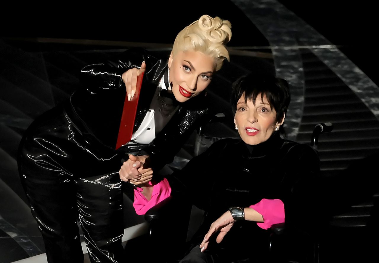 Lady Gaga and Liza Minnelli appear on stage together to present the Oscar for best picture.