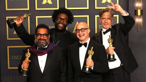 Joseph Patel, Ahmir "Questlove" Thompson, David Dinerstein and Robert Fyvolent, winners of Best Documentary Feature for "Summer of Soul (...Or, When the Revolution Could Not Be Televised)," pose in the press room during the 94th Annual Academy Awards. Look at those grins!