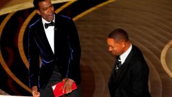 Presenter Chris Rock, left, reacts after Will Smith slapped him onstage at the Oscars, Sunday, March 27, 2022, at the Dolby Theatre in Los Angeles.