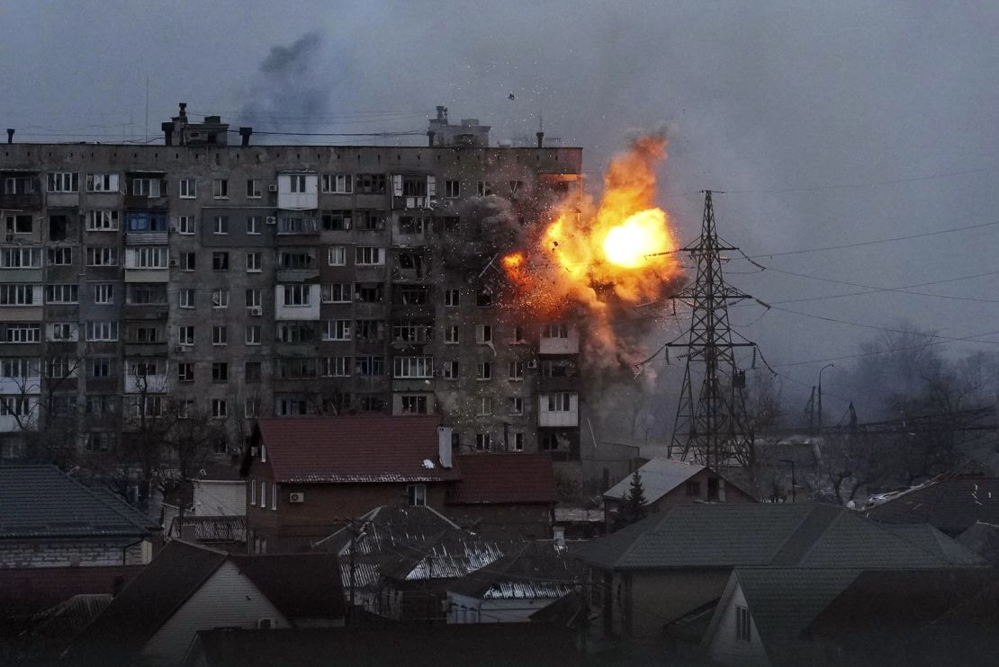 Russian forces fire at an apartment building in Mariupol, Ukraine on March 11, 2022.