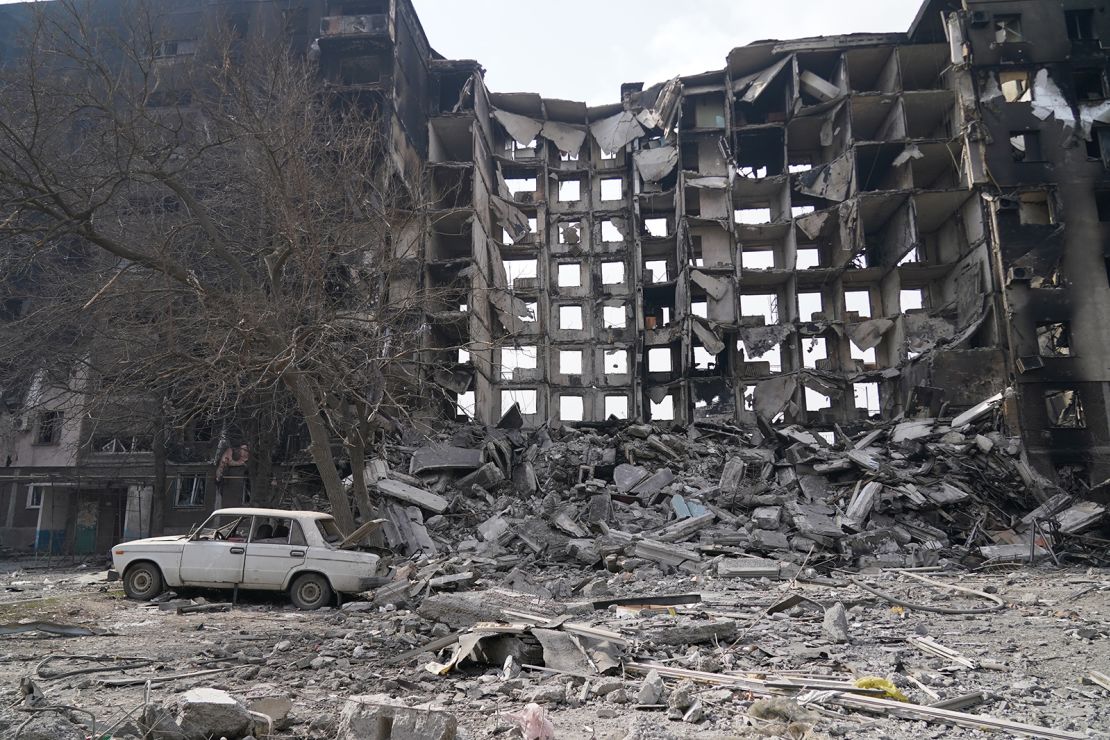 Collapsed building is seen as civilians are evacuated along humanitarian corridors from the Ukrainian city of Mariupol under the control of Russian military and pro-Russian separatists, on March 26, 2022. 