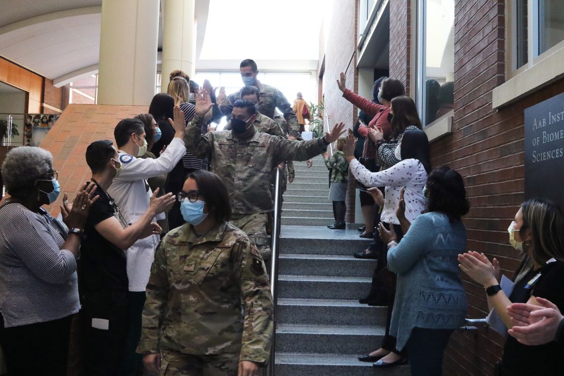 University of Rochester Medical Center staff join together to say goodbye to the US Air Force medical team members who supported COVID response operations at University of Rochester Medical Center, Rochester, New York on March 17, 2022.