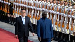 Solomon Islands Prime Minister Manasseh Sogavare (R) and Chinese Premier Li Keqiang inspect honour guards during a welcome ceremony at the Great Hall of the People in Beijing on October 9, 2019. (Photo by WANG ZHAO / AFP) (Photo by WANG ZHAO/AFP via Getty Images)