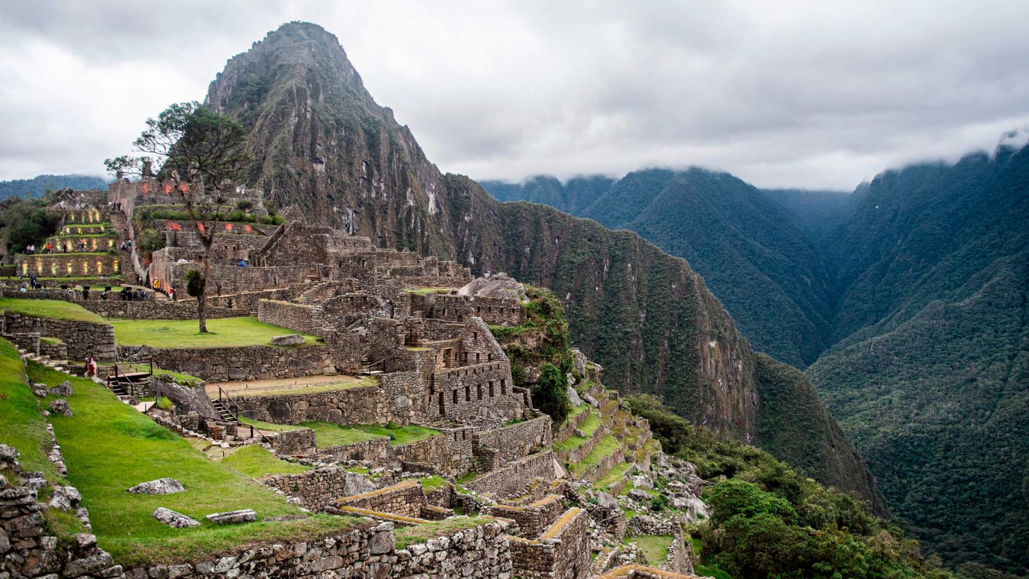 TOPSHOT - View of the archaeological site of Machu Picchu, in Cusco, Peru during its reopening ceremony on November 01, 2020, amid the new coronavirus pandemic. - The Inca citadel of Machu Picchu reopened on Sunday in the framework of a gradual decrease in COVID-19 contagions in Peru, after remaining empty almost eight months, affecting the tourism sector severely (Photo by ERNESTO BENAVIDES / AFP) (Photo by ERNESTO BENAVIDES/AFP via Getty Images)