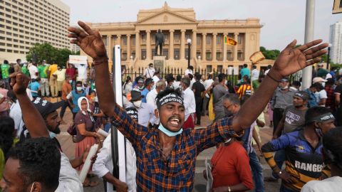 Opposition party supporters shout slogans during a protest outside the President's office in Colombo, Tuesday, March 15, 2022.